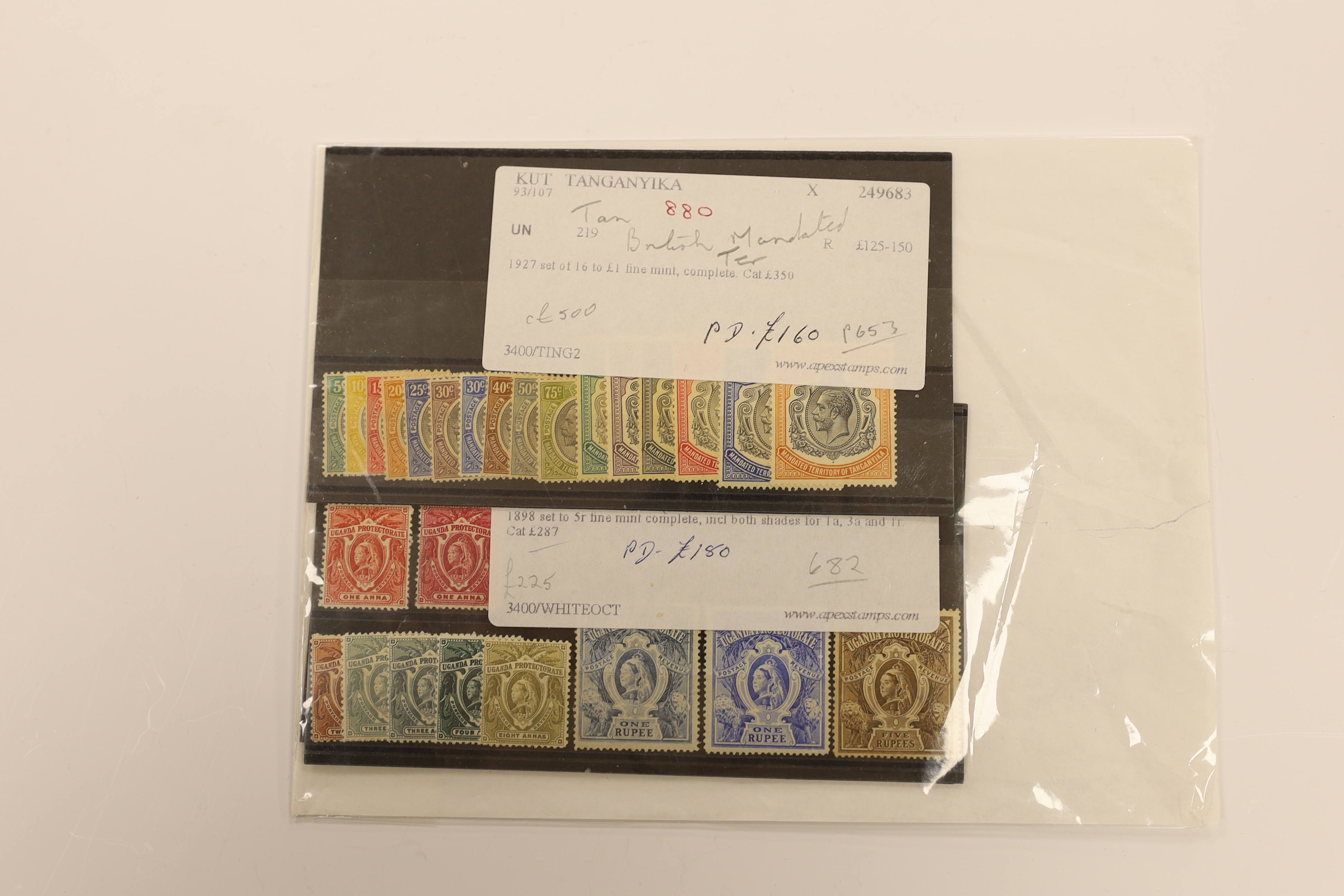 A selection of stamps including British East Africa, 1897 1r to 4r, Leeward Islands 1890 set, 1921 set to £1, K.U.T. 1912 1c to 10r, Tangyika 1927 to £1, Uganda 1898 set, Mauritius 1879-80 set, 1921 to 10r (2) etc.